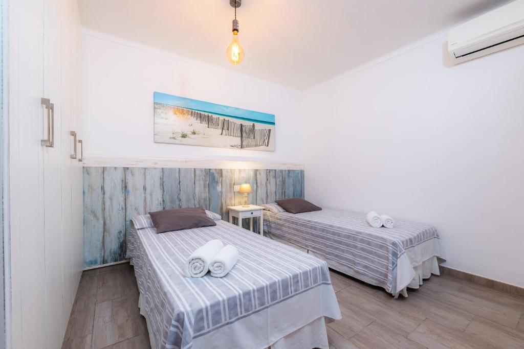 Posteľ alebo postele v izbe v ubytovaní Casa Cantino
