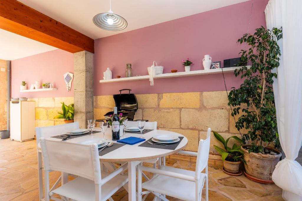 Televízia a/alebo spoločenská miestnosť v ubytovaní Casa Cantino