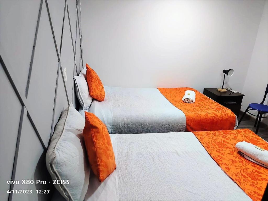 Postel nebo postele na pokoji v ubytování Hotel Kristal Ferial