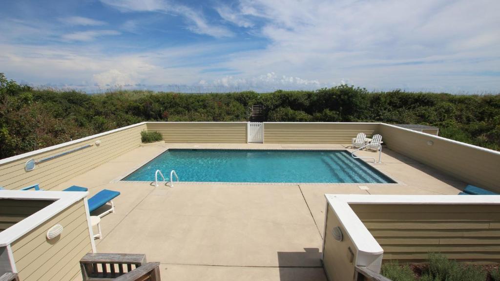 a swimming pool on top of a house at PI76, Life of Reilly- Oceanfront, Ocean Views, Private Pool, Private Beach Access, Foosball in Corolla