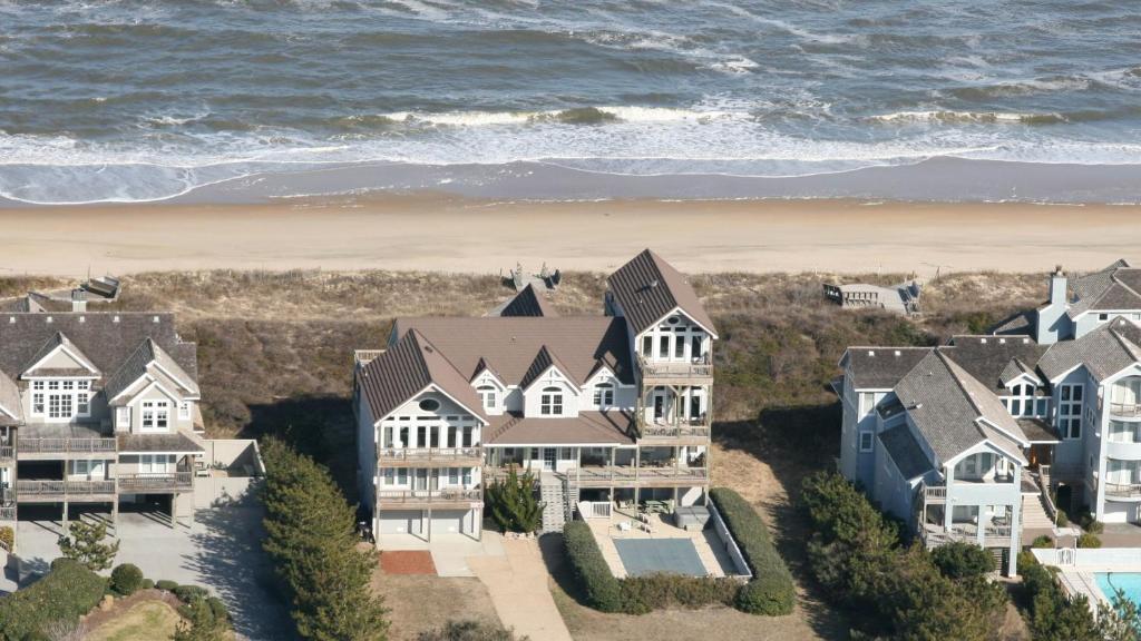 an aerial view of a house on the beach at OCEANFRONT, Ocean Views, Priv Pool, Rec Room, 8 BRS, PM2, Old Glory in Sanderling