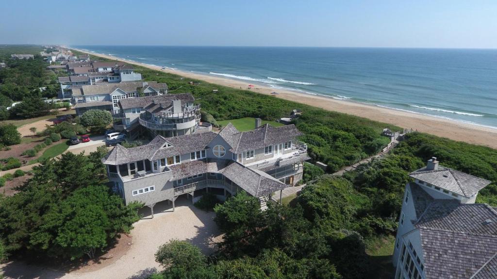 an aerial view of a large house on the beach at OCEANFRONT, Amazing Ocean and Sound Views, Scrnd Porch, PM1, Ariel in Sanderling