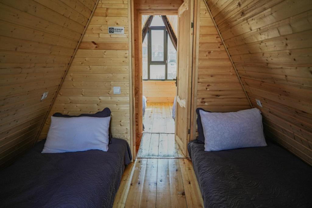 Postel nebo postele na pokoji v ubytování Peak View Kazbegi
