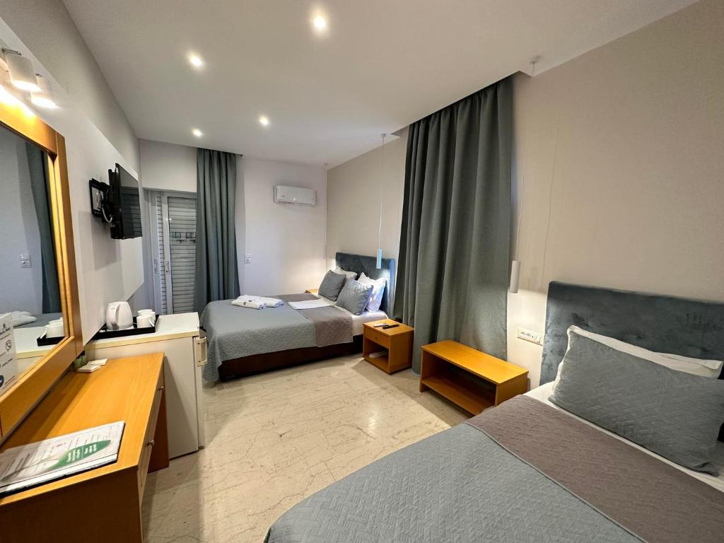 Postel nebo postele na pokoji v ubytování Castro Hotel