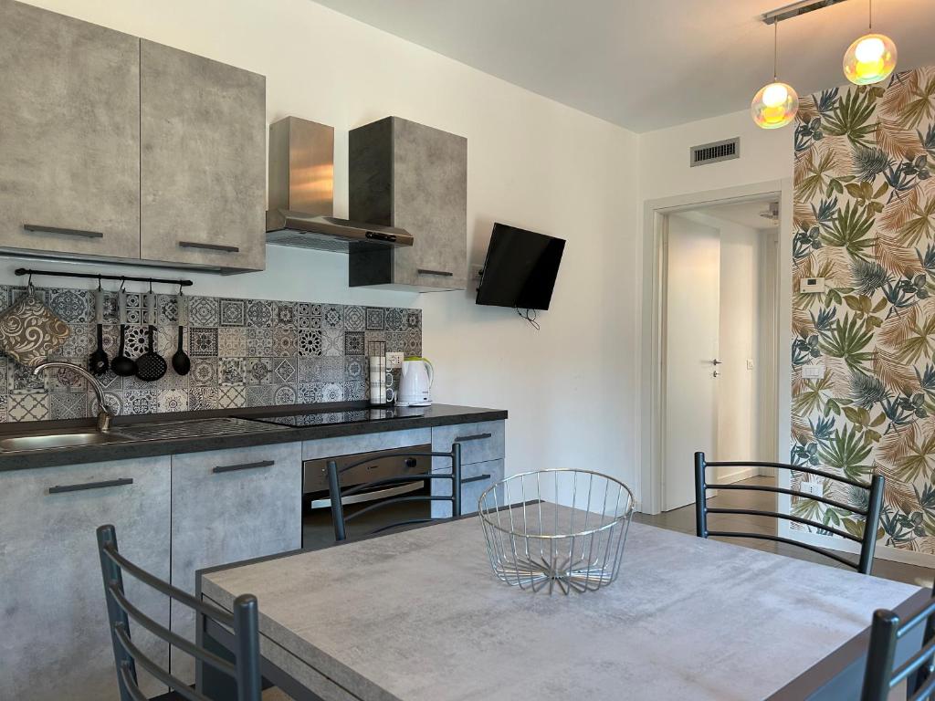 Kuchyňa alebo kuchynka v ubytovaní Vivaldi Home - Immobili e Soluzioni Rent