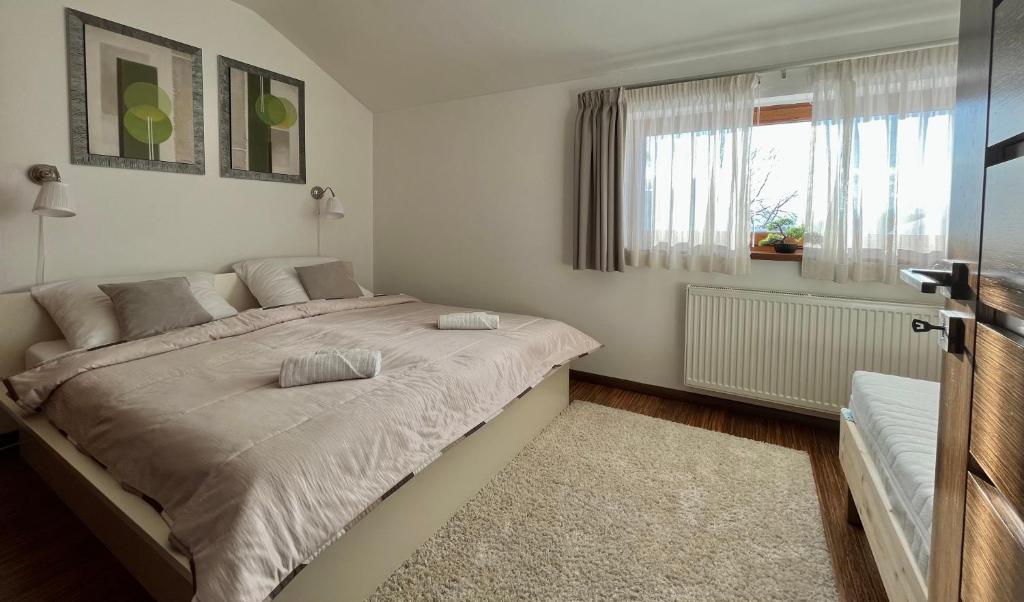 Postel nebo postele na pokoji v ubytování Apartmánový Dom 44