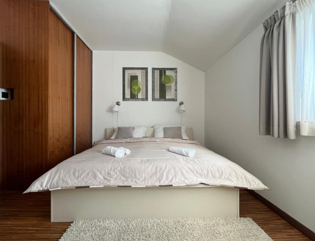 Postel nebo postele na pokoji v ubytování Apartmánový Dom 44