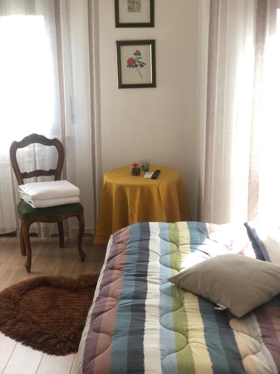 A bed or beds in a room at B&B Belli Dentro