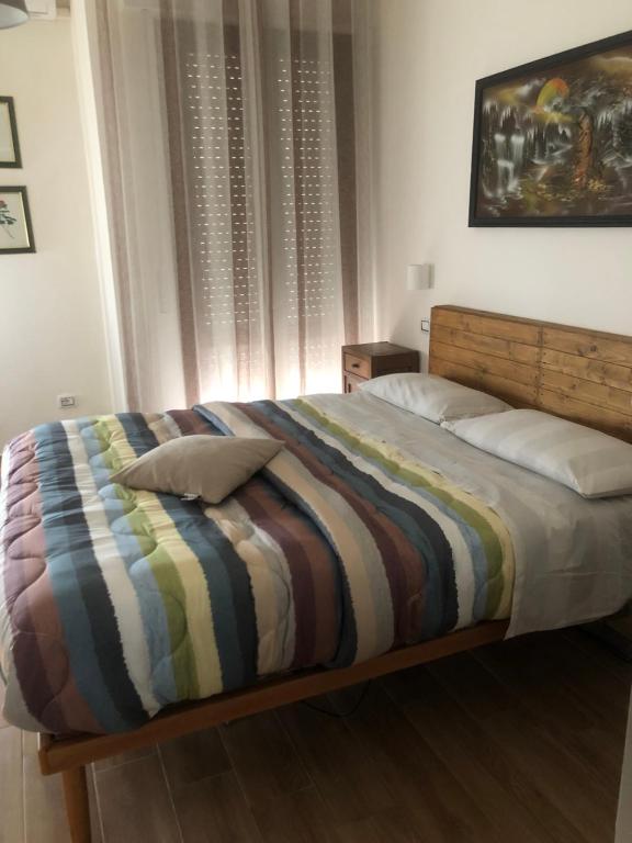 A bed or beds in a room at B&B Belli Dentro