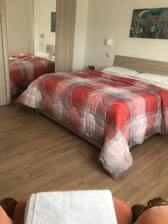 A bed or beds in a room at B&B Belli Dentro