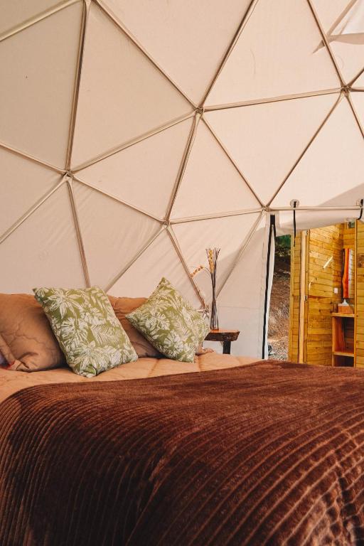 Letto o letti in una camera di Alma de Campo Glamping - Laguna de Suesca