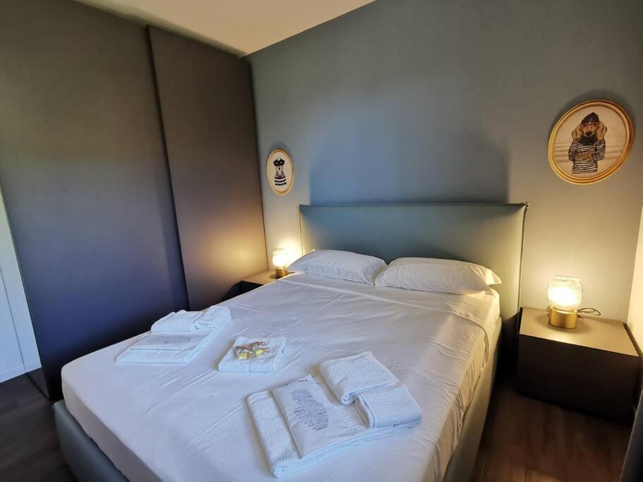 Postel nebo postele na pokoji v ubytování Appartamento Villa Martinoni