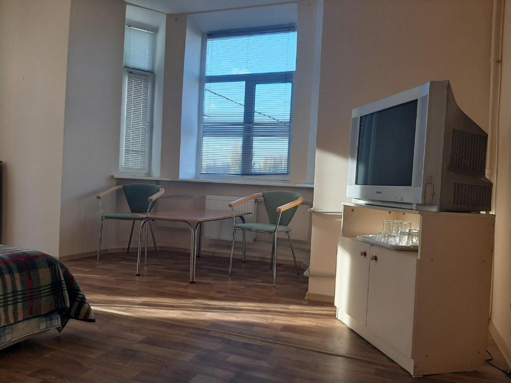 TV a/nebo společenská místnost v ubytování Apart-Hotel Parasolka