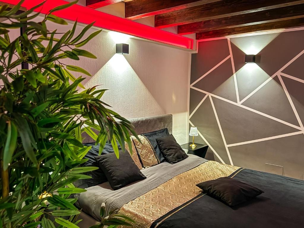 Posteľ alebo postele v izbe v ubytovaní Rouge Suite & SPA PALERMO CENTRO