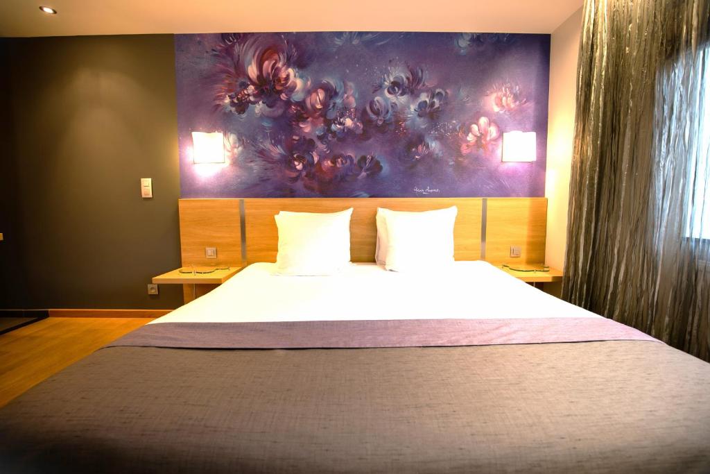 Postel nebo postele na pokoji v ubytování Hôtel-Restaurant L'Auberge
