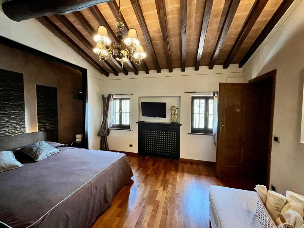 Postel nebo postele na pokoji v ubytování Villa Daniela