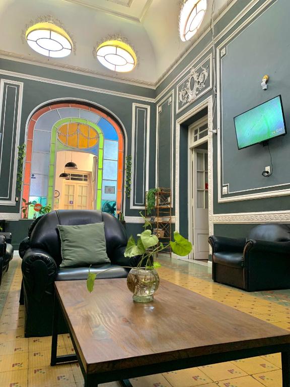 TV a/nebo společenská místnost v ubytování Hostel Alvear