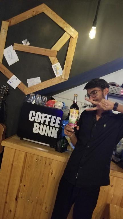 Os clientes hospedados em CoffeeBunk Hostel