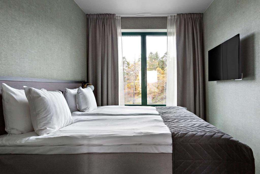 Postel nebo postele na pokoji v ubytování Best Western Plus Hotel Kungens Kurva