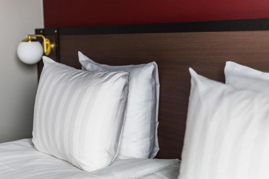 Postel nebo postele na pokoji v ubytování Best Western Plus Hotel Kungens Kurva