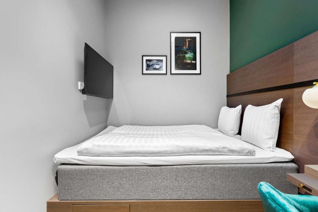 Postel nebo postele na pokoji v ubytování Best Western Plus Hotel Kungens Kurva