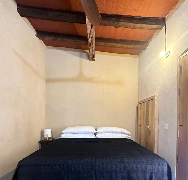Postel nebo postele na pokoji v ubytování CASA PENUMBRA- Centro Oaxaca