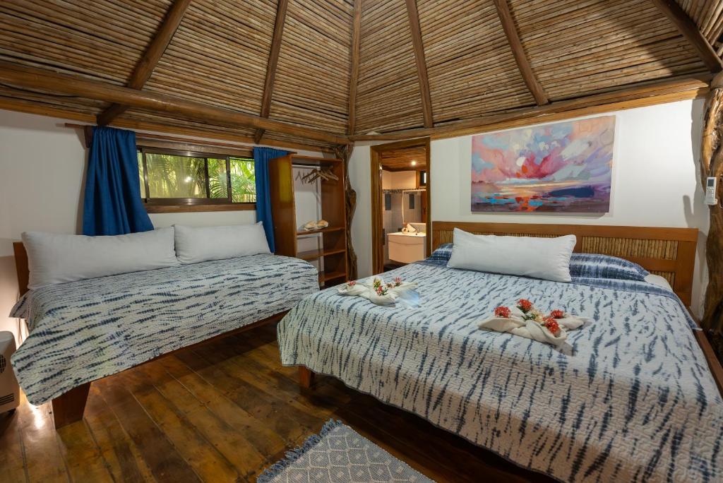 Postel nebo postele na pokoji v ubytování B&B Ranchos Itaúna