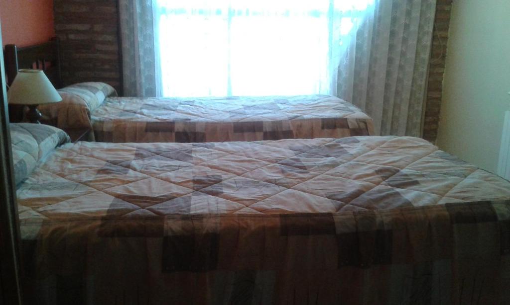 Postel nebo postele na pokoji v ubytování Casa Jabonero