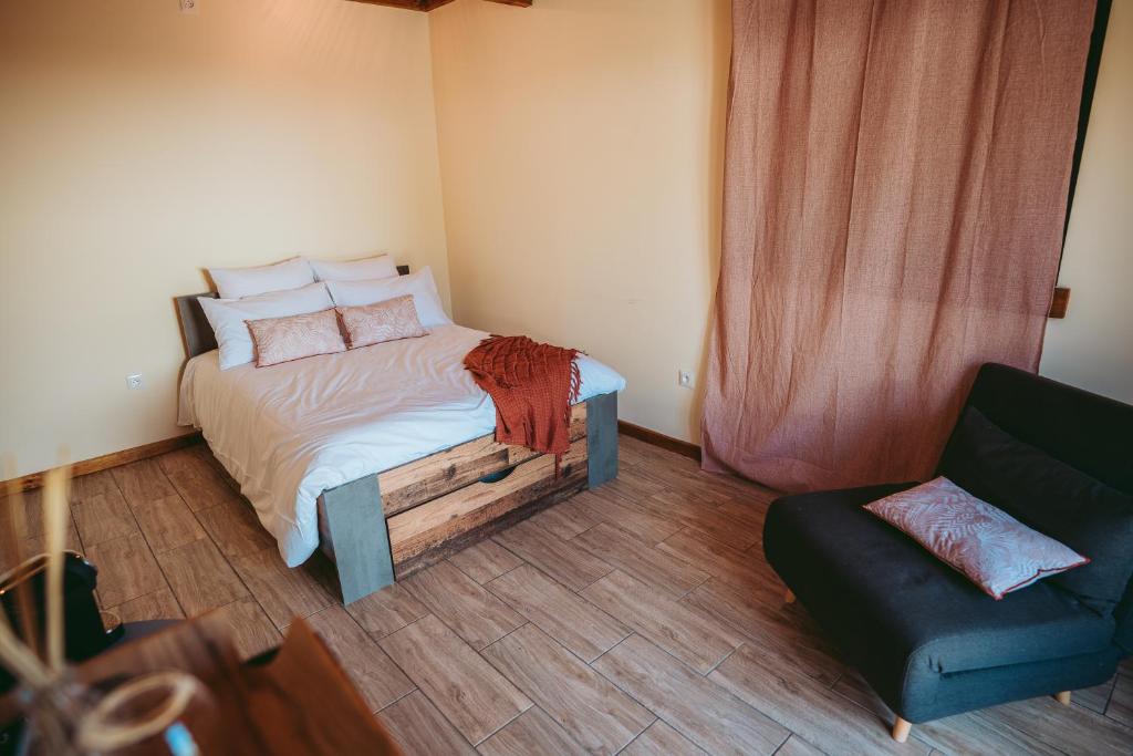 Postel nebo postele na pokoji v ubytování L'Auberge Créole
