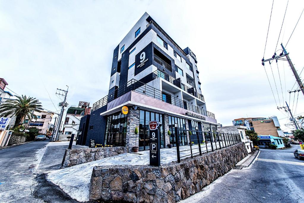 a building on the side of a street at Nine Boutique Hotel in Seogwipo