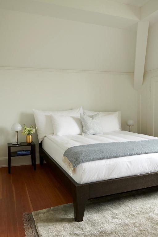 Letto o letti in una camera di Signau House & Garden Boutique Hotel Zürich