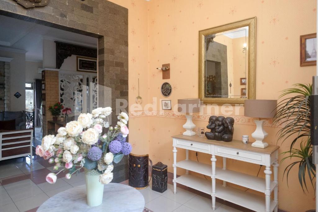 Fotografie z fotogalerie ubytování Just 11 Boutique Syariah Mitra RedDoorz near UGM Yogyakarta v destinaci Kejayan