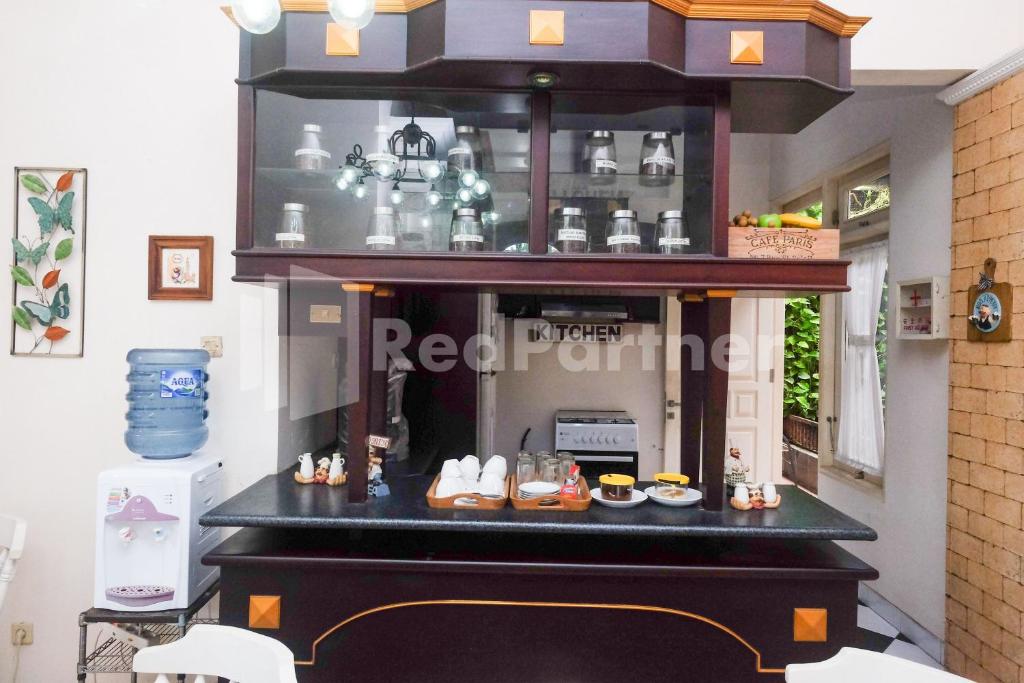 Kuchyň nebo kuchyňský kout v ubytování Just 11 Boutique Syariah Mitra RedDoorz near UGM Yogyakarta