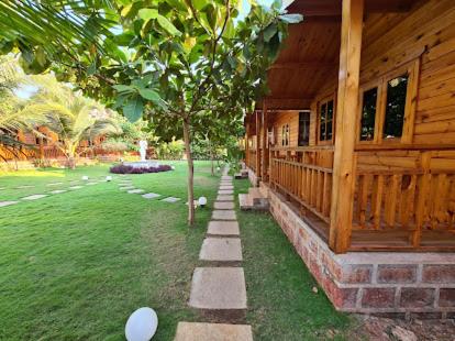 Zahrada ubytování TP cottages Beach Resort