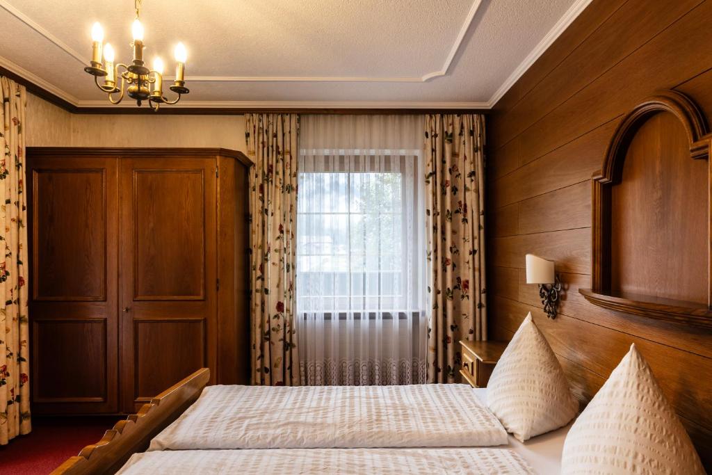 Postel nebo postele na pokoji v ubytování Hotel Elisabeth