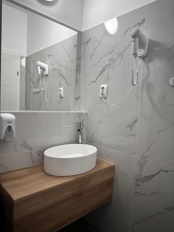 Koupelna v ubytování Hotel PASO