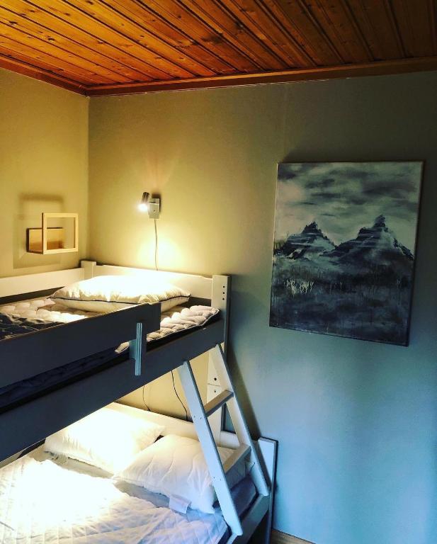 Postel nebo postele na pokoji v ubytování Messlingen, Orrstigen 5