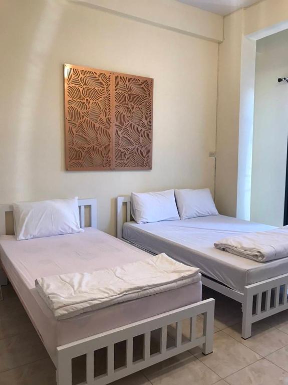 Postel nebo postele na pokoji v ubytování Joox B - Serviced Apartment