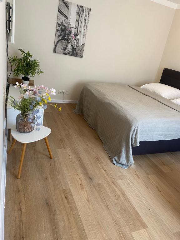 Postel nebo postele na pokoji v ubytování STING Apartments Havířov