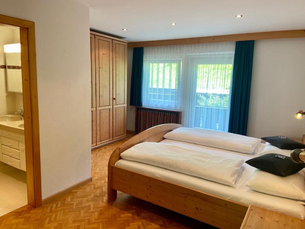A bed or beds in a room at Villa Erika