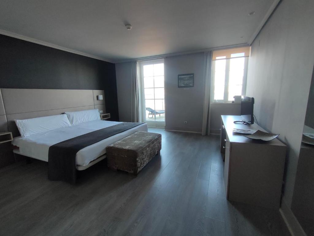 Postel nebo postele na pokoji v ubytování Hotel Igeretxe