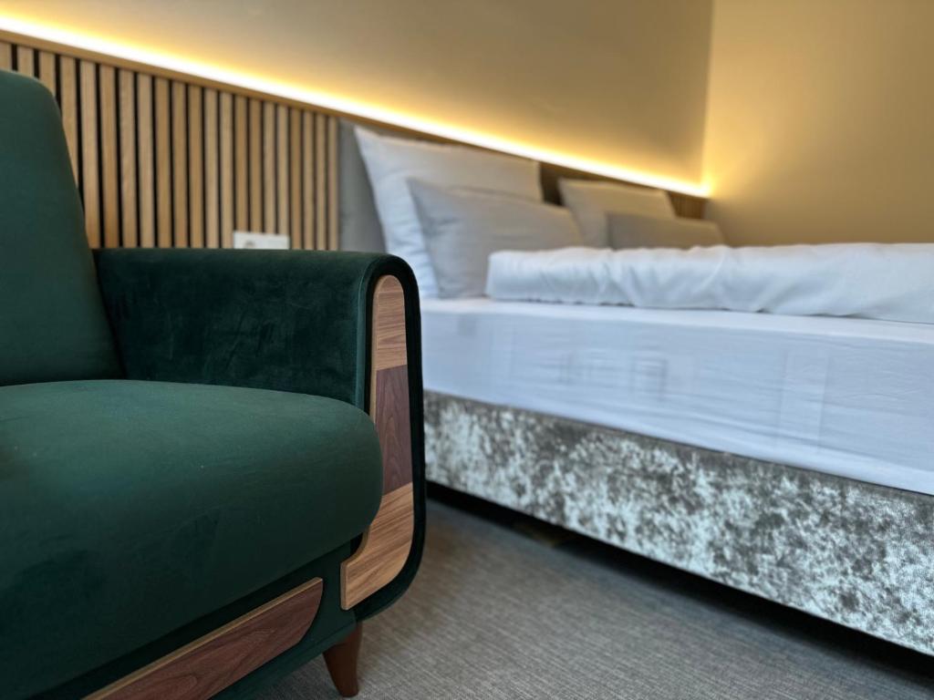 Postel nebo postele na pokoji v ubytování Boutique Hotel GreenLeaf