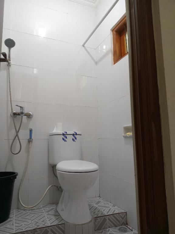 Koupelna v ubytování umah kampung bendul
