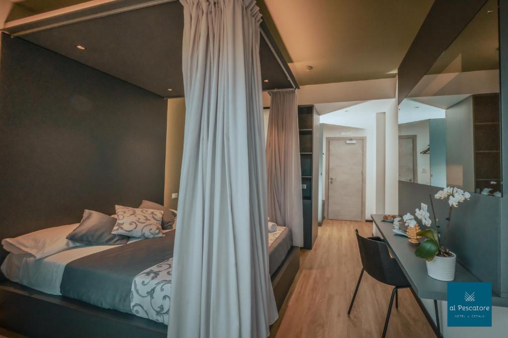 Postel nebo postele na pokoji v ubytování Al Pescatore Suites