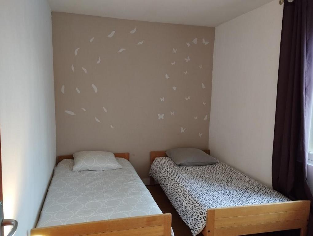 Postel nebo postele na pokoji v ubytování Le Bol d'Air