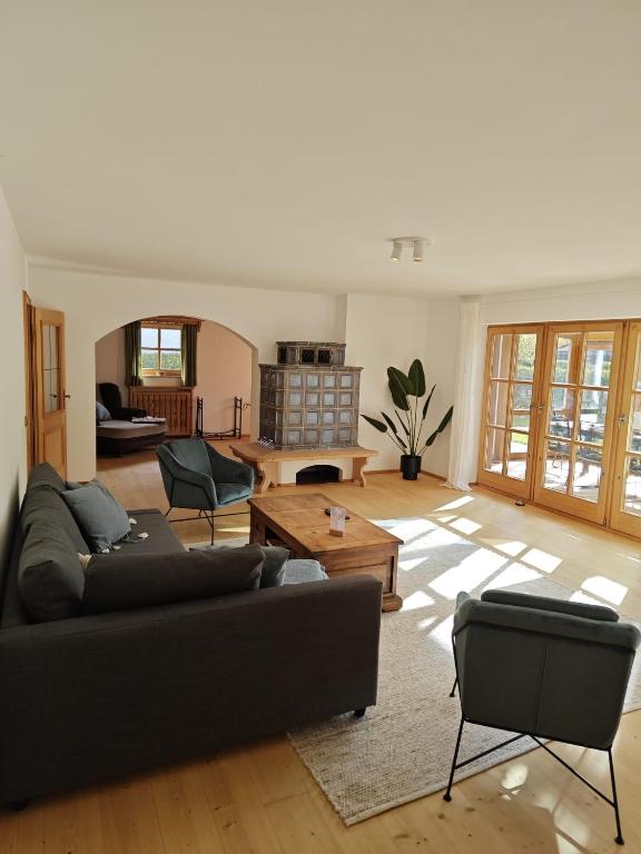 Posezení v ubytování Ferienhaus Weißachdamm am Tegernsee