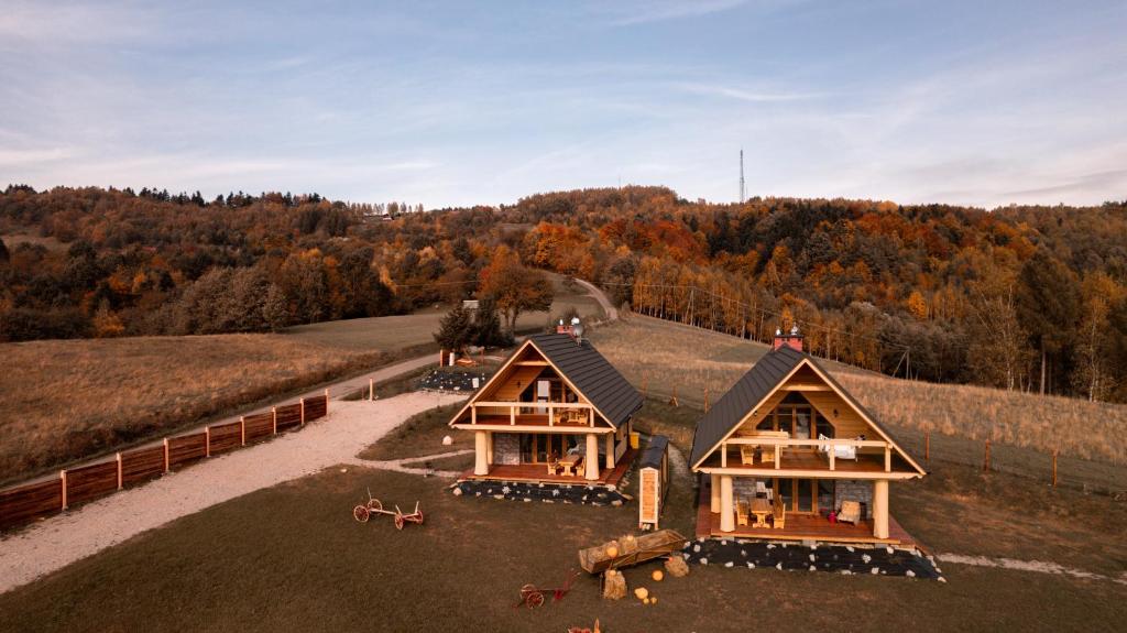 an aerial view of a house in the woods at Wood Szczęścia in Korczyna