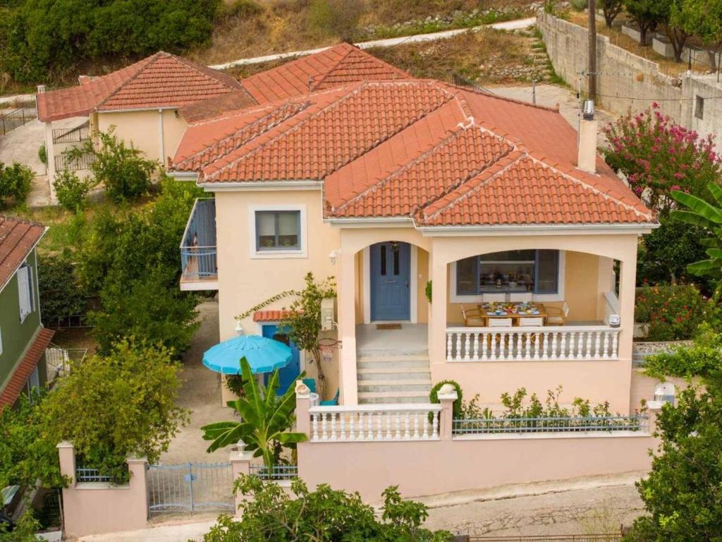 a house with an orange tiled roof at House Kochyli in Kefallonia