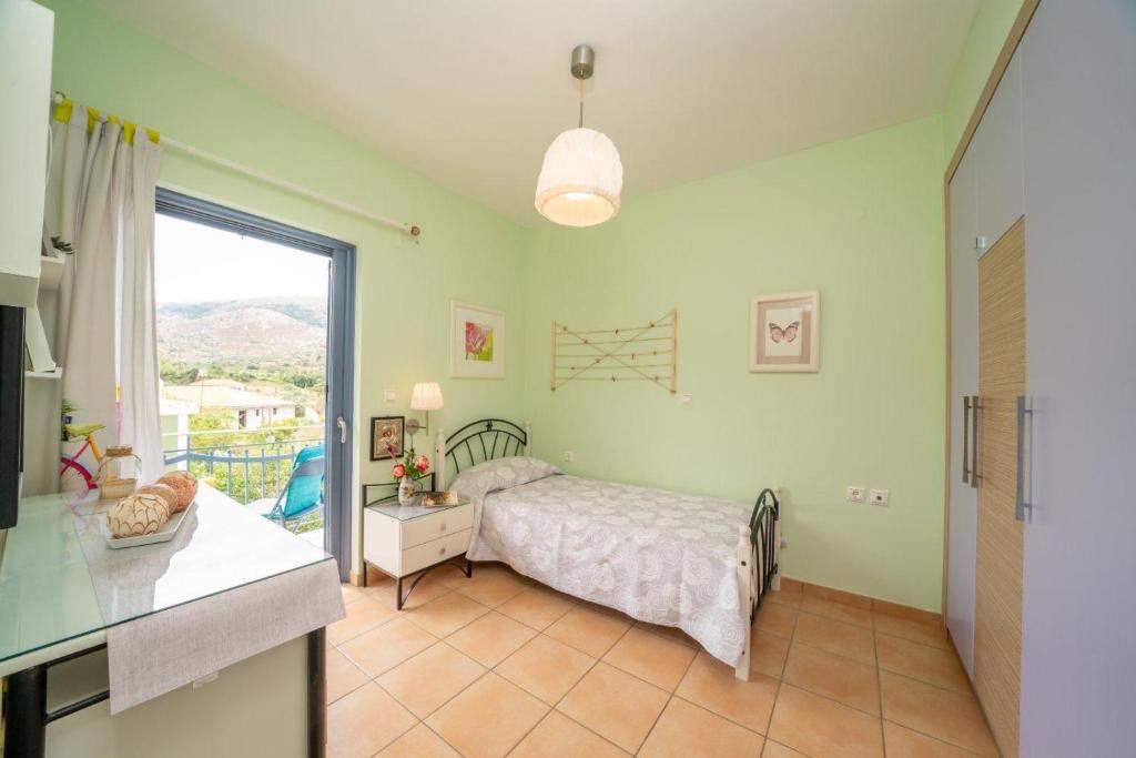 Postel nebo postele na pokoji v ubytování House Kochyli
