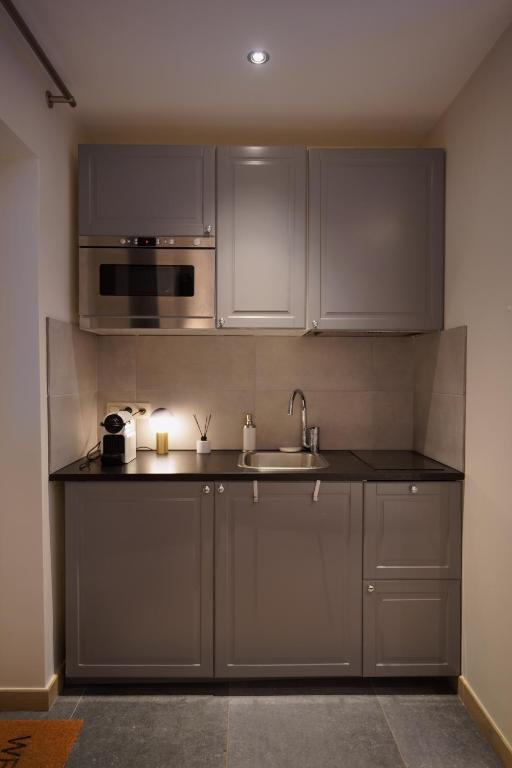 Kuchyň nebo kuchyňský kout v ubytování B&B SPA CITADELLE